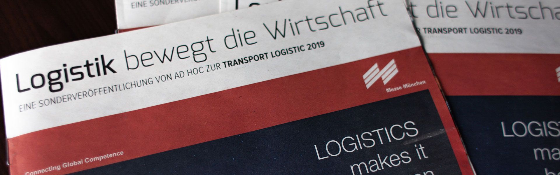 Close-up of the cover of a magazine with the headline "Logistics drives the economy"